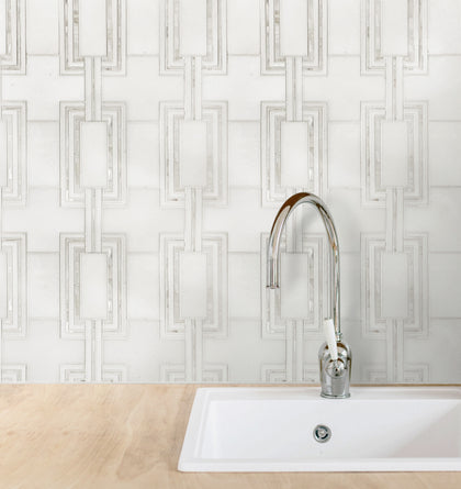 Kitchen backsplash featuring Thassos & Mother of Pearl Waterjet Mosaic Tile – radiant blend of white marble and shimmering mother of pearl.