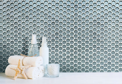 Modern bathroom wall with Inkjet Blue Glass Penny Mosaic Tile – bold and glossy round tile accent