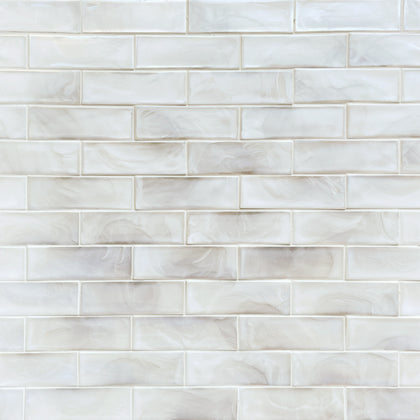Sample board displaying White Glazed Hot 12-in x 12-in Glass Mosaic Tiles – contemporary clean look