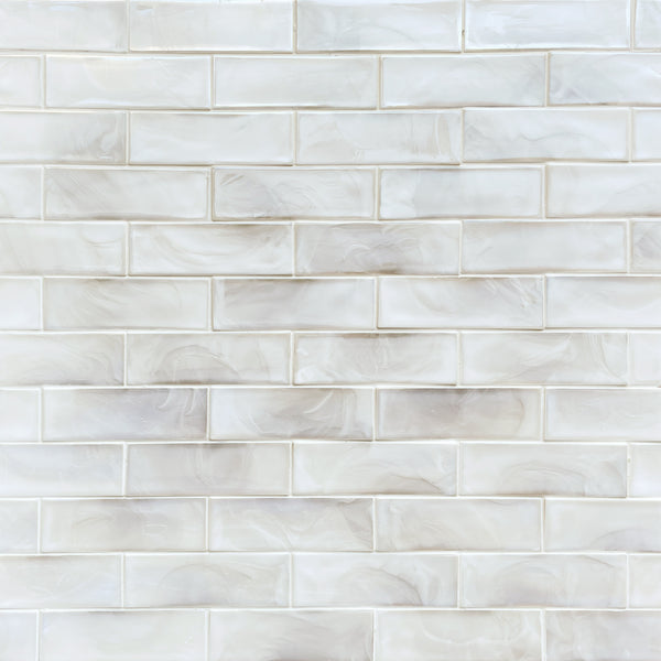 Sample board displaying White Glazed Hot 12-in x 12-in Glass Mosaic Tiles – contemporary clean look