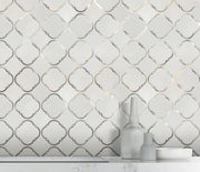 Accent wall with 12.3x12.3 Thassos Marble and Metal Waterjet Mosaic – sophisticated design with polished marble and metal pattern trim