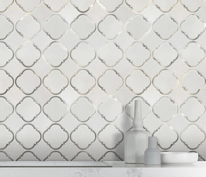 Accent wall with 12.3x12.3 Thassos Marble and Metal Waterjet Mosaic – sophisticated design with polished marble and metal pattern trim
