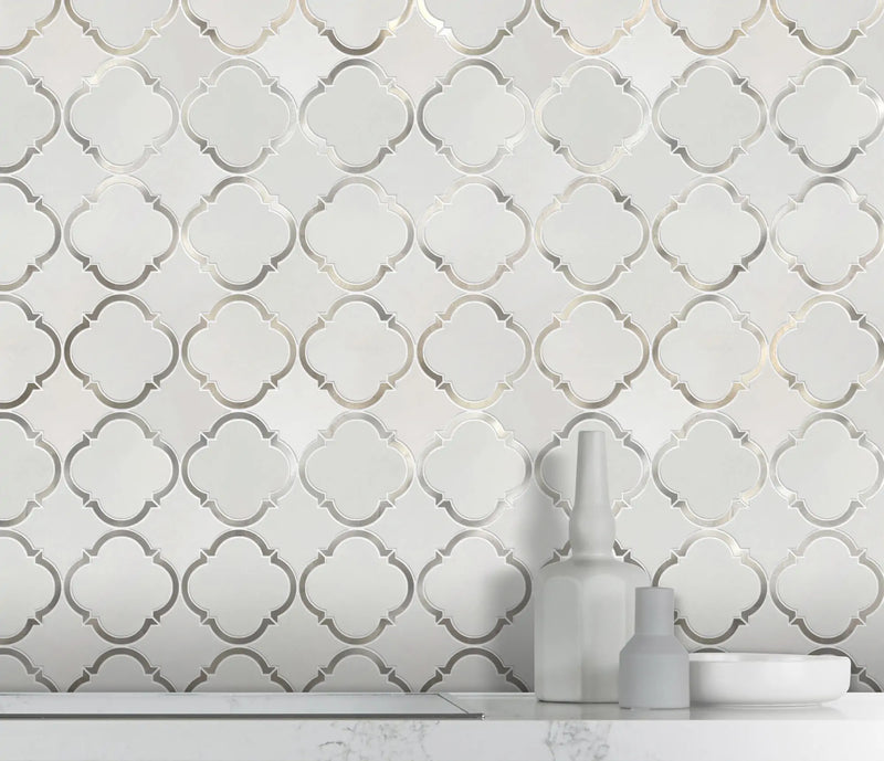 Accent wall with 12.3x12.3 Thassos Marble and Metal Waterjet Mosaic – sophisticated design with polished marble and metal pattern trim