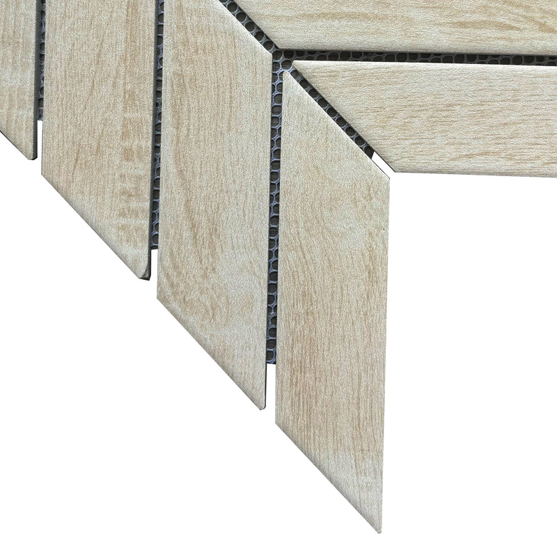 Close-up of chevron texture and wood grain on porcelain mosaic tile – natural and slip-resistant surface