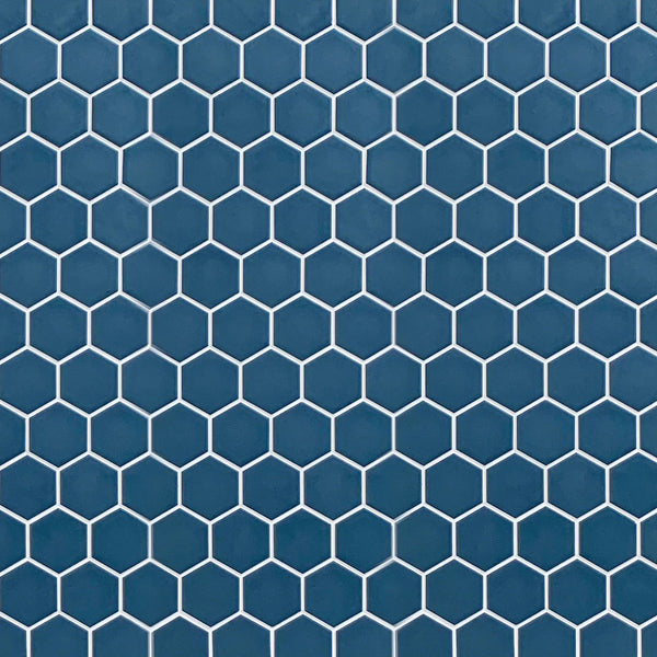 Display board featuring Wave Navy Blue 2-inch Hexagon Matte Porcelain Mosaic Tile – elegant navy blue pattern layout.