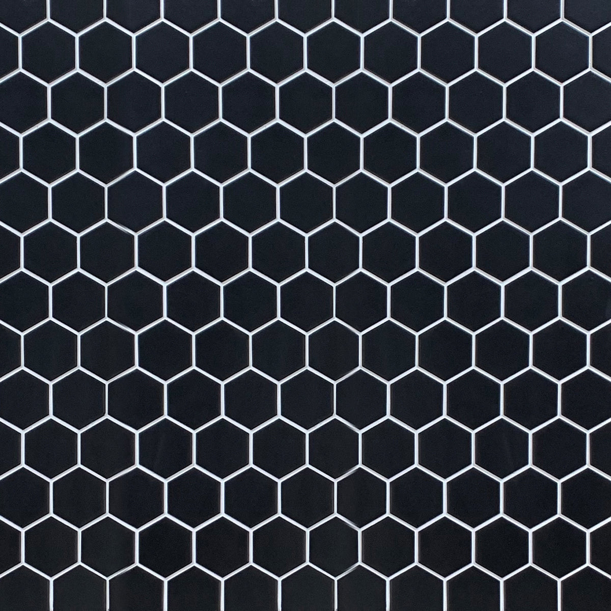 Showroom board of 13x11 inch Black Hexagon Matte Porcelain Mosaic – sleek modern presentation with bold geometric design.