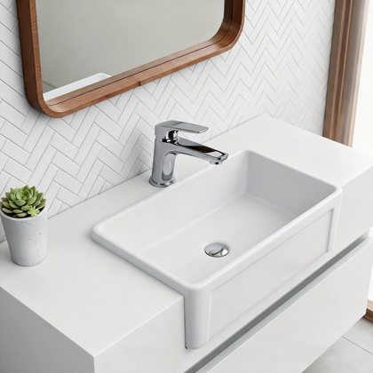 30 inch white ceramic farmhouse sink displayed in modern kitchen with sleek faucet and stylish decor.