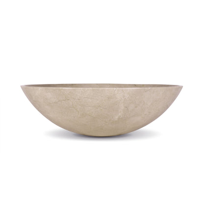 Unique bathroom sink in beige marble, handcrafted round vessel sink, elegant natural stone basin for bathrooms.