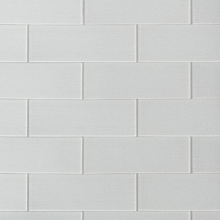 Linen Ice glass wall tiles, 4x12 inch with champagne hue, perfect for kitchen backsplashes, bathroom walls, and elegant interiors.