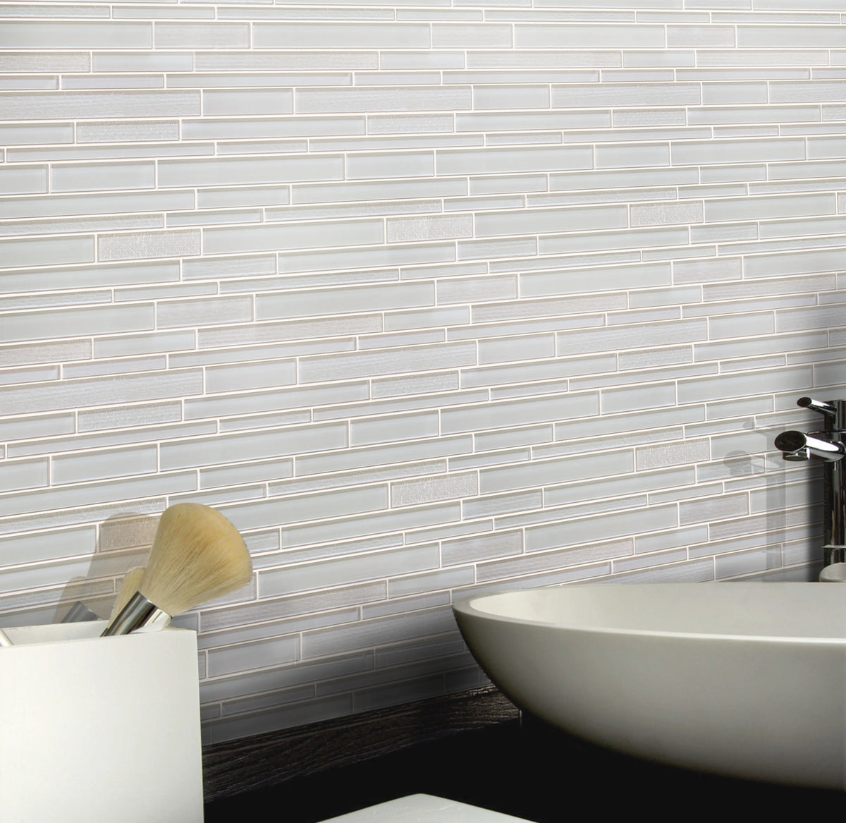 Bathroom wall decorated with White Staccato Marble & Glass Random Strips Mosaic Tiles – clean and luminous white marble with glass details.