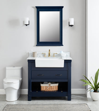 Elegant navy blue bathroom vanity mirror above a modern sink and cabinet in a stylish bathroom setting.