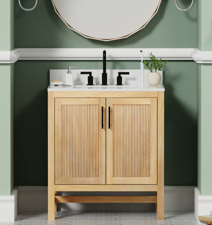 30 inch light teak bathroom vanity with white quartz top, featuring ribbed doors and modern black faucets.