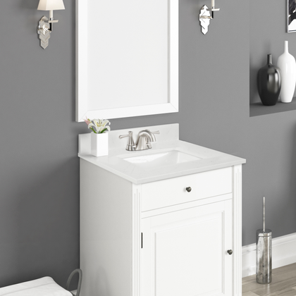 25" Carrara quartz vanity top with sink displayed in elegant bathroom setting.