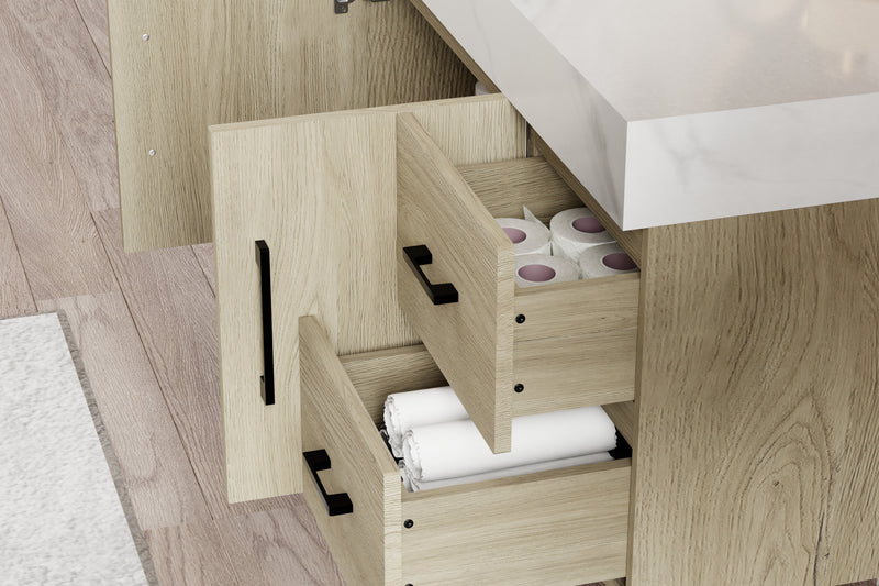 Interior view of dark oak bathroom vanity with sintered stone top featuring smart storage drawers.