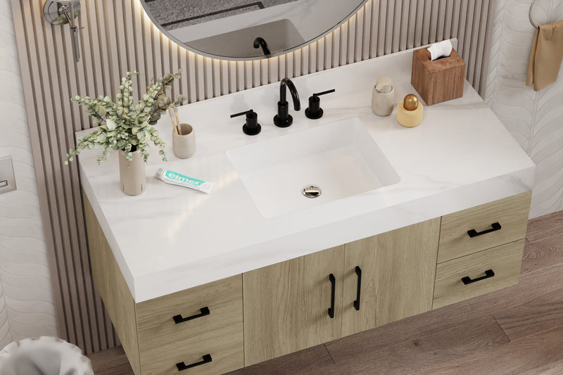 Dark oak bathroom vanity with sintered stone top featuring modern faucet and decorative accessories.