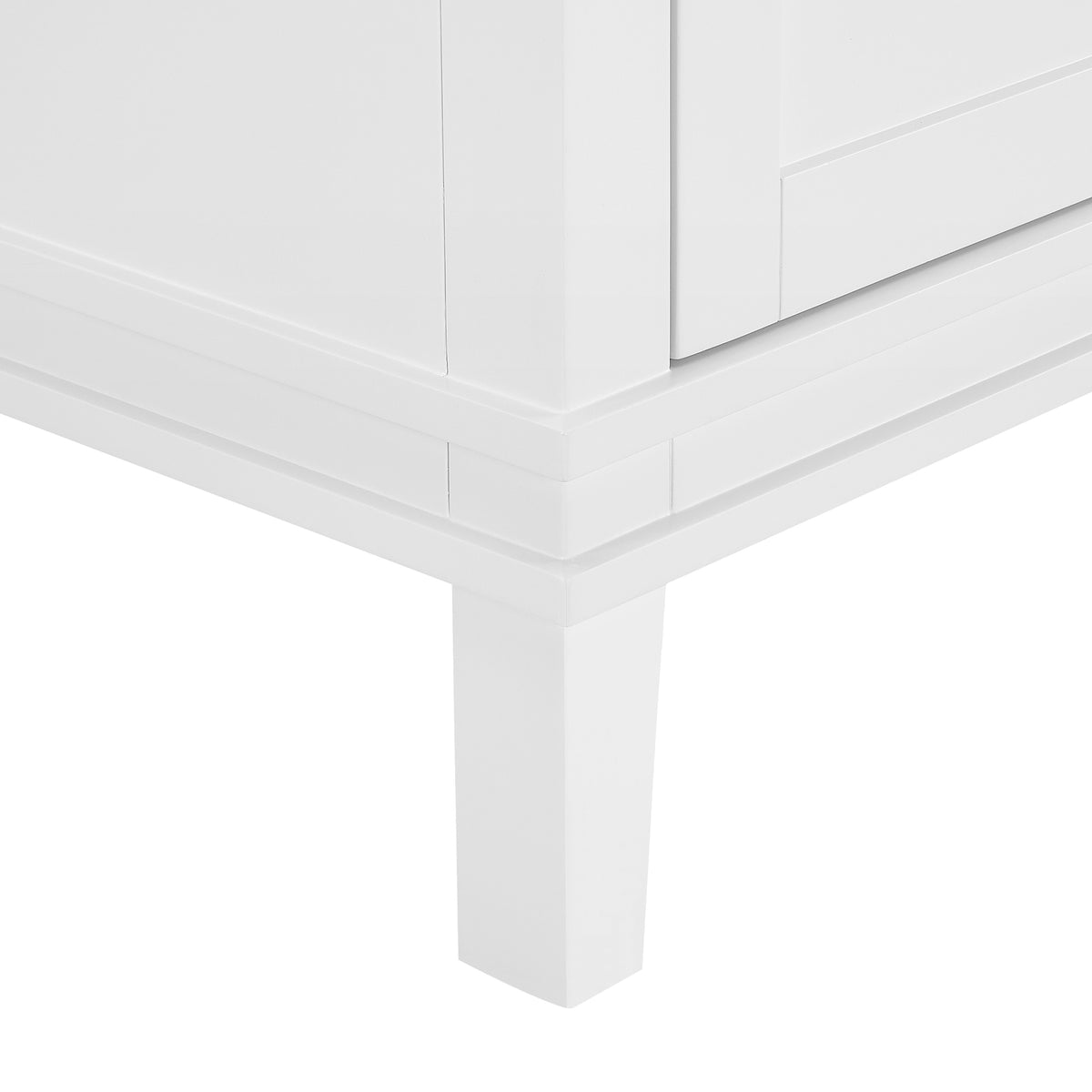 Close-up of the sleek leg design of the Elmington white vanity with porcelain top.