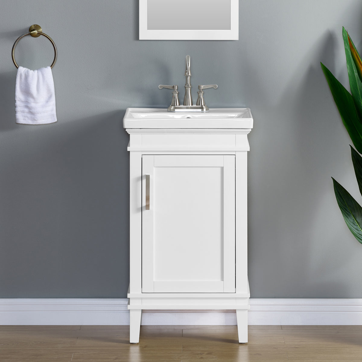Elmington white vanity with porcelain top 20 inches, designed for small spaces, featuring sleek compact design and modern faucet.