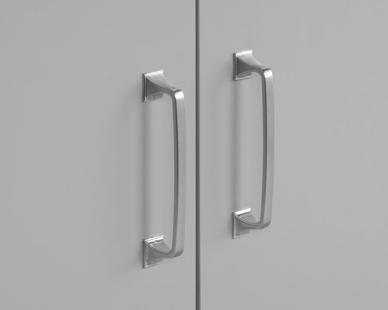 Close-up of sleek silver handles on a 60 inch gray double vanity with quartz top.