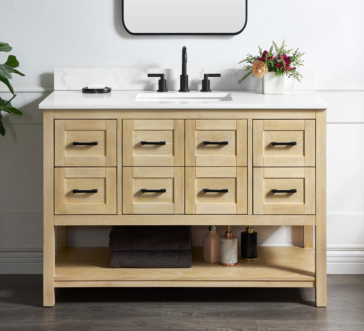 Natural oak vanity base with multiple drawers and a white countertop, designed for modern bathrooms.
