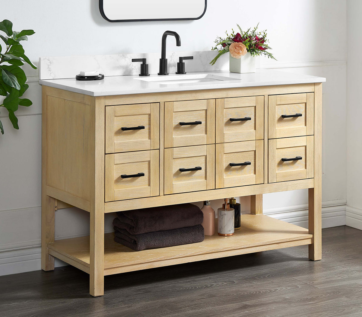 Natural oak vanity base with eight drawers and a white countertop in a stylish bathroom setting.