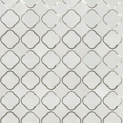 Sample board of Thassos & Patterned Metal Trim Waterjet Mosaic Tile – elegant showroom presentation of marble and metal combination