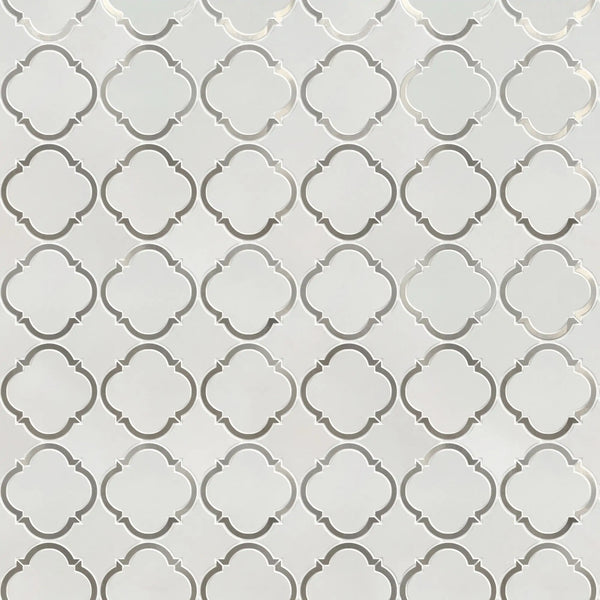 Sample board of Thassos & Patterned Metal Trim Waterjet Mosaic Tile – elegant showroom presentation of marble and metal combination