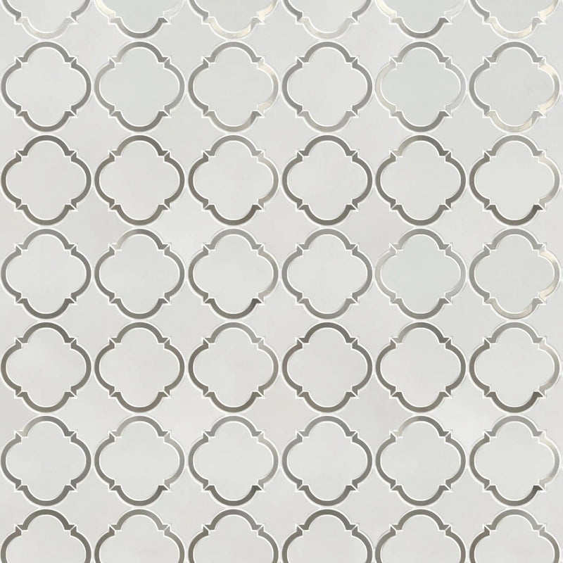 Sample board of Thassos & Patterned Metal Trim Waterjet Mosaic Tile – elegant showroom presentation of marble and metal combination