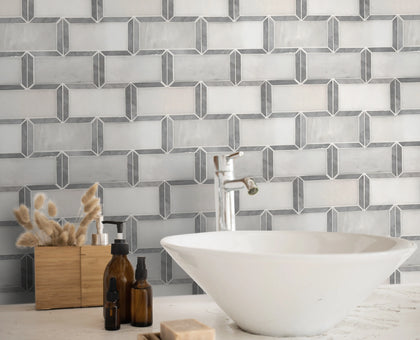 Kitchen backsplash with Oriental White Subway Tile and Carrara Border – polished marble adds bright, clean look