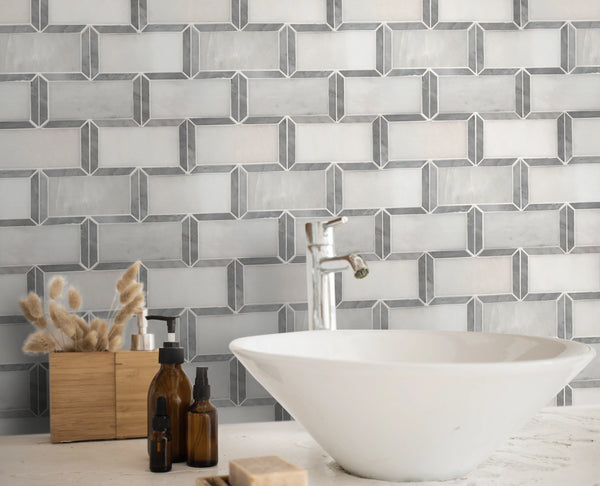 Kitchen backsplash with Oriental White Subway Tile and Carrara Border – polished marble adds bright, clean look