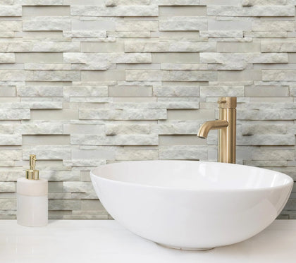 Bathroom wall featuring White Split Faced Slate Quartzite Mosaic Tile – textured natural stone adds depth