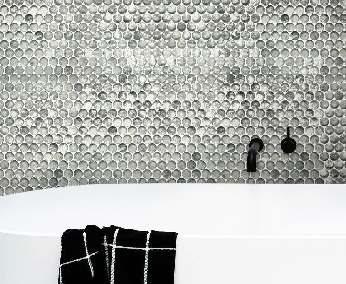 Bathroom wall featuring Blue & Gray Textured Penny Round Glass Mosaic Tiles – soft blue and gray tones create a cozy, modern bathroom feel