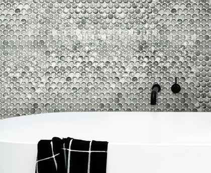 Bathroom wall featuring Blue & Gray Textured Penny Round Glass Mosaic Tiles – soft blue and gray tones create a cozy, modern bathroom feel