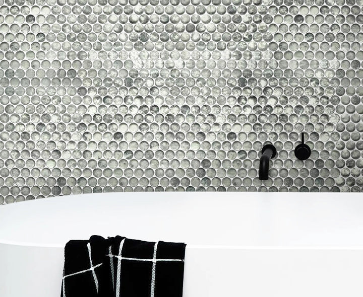 Bathroom wall featuring Blue & Gray Textured Penny Round Glass Mosaic Tiles – soft blue and gray tones create a cozy, modern bathroom feel