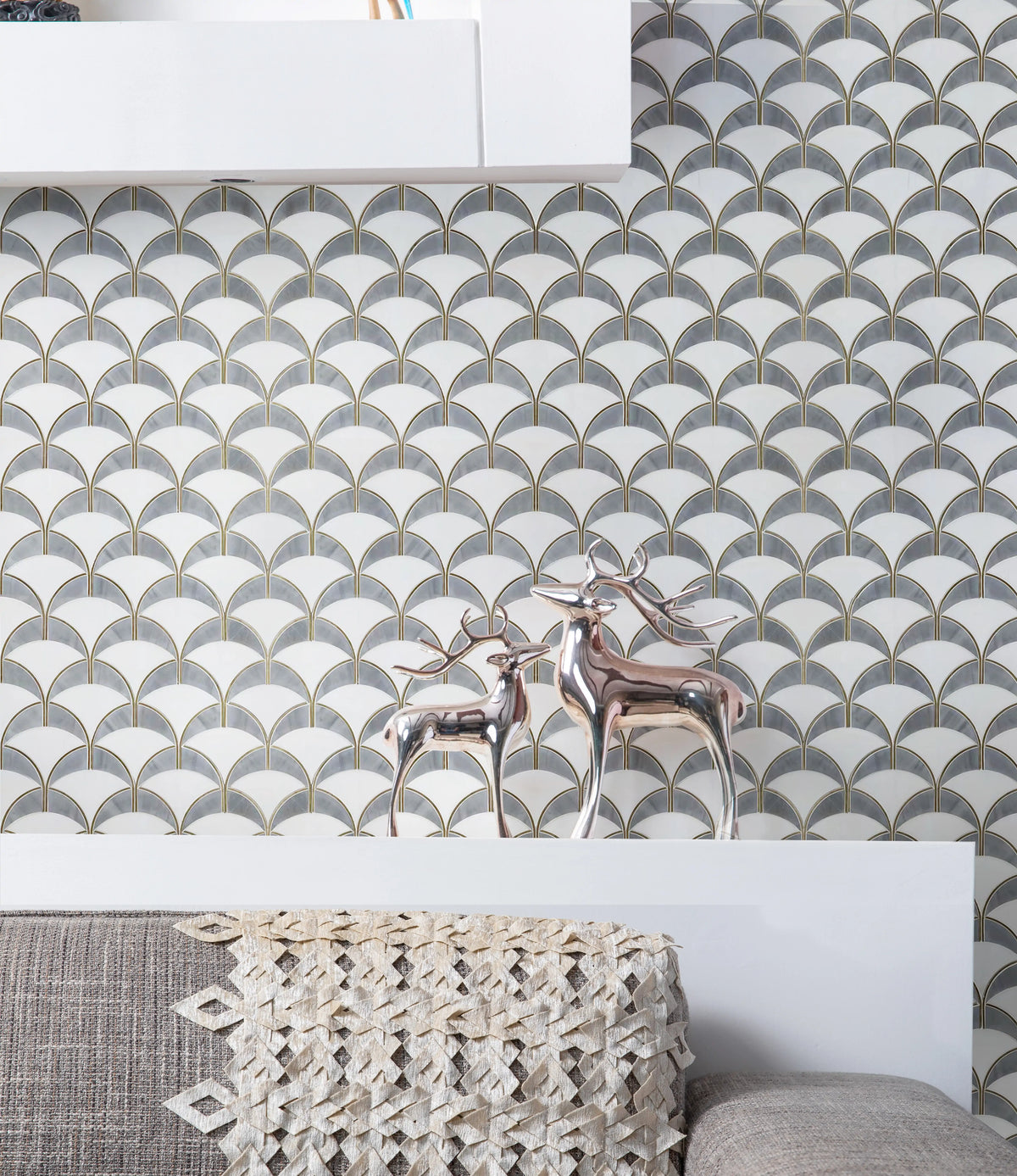 Bathroom accent wall featuring Thassos & Shell Waterjet Tile – polished surface with luxurious gold highlights