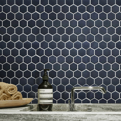 Sleek kitchen flooring with Black Hexagon 13x11 Porcelain Tile – bold matte finish adds depth and texture.