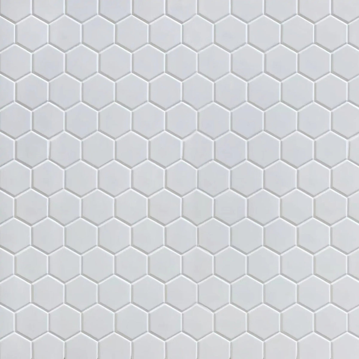 Sample board of White 2-in Hexagon Matte Porcelain Mosaic Tile – showroom-ready 12x12 inch sheet presentation for customer viewing.