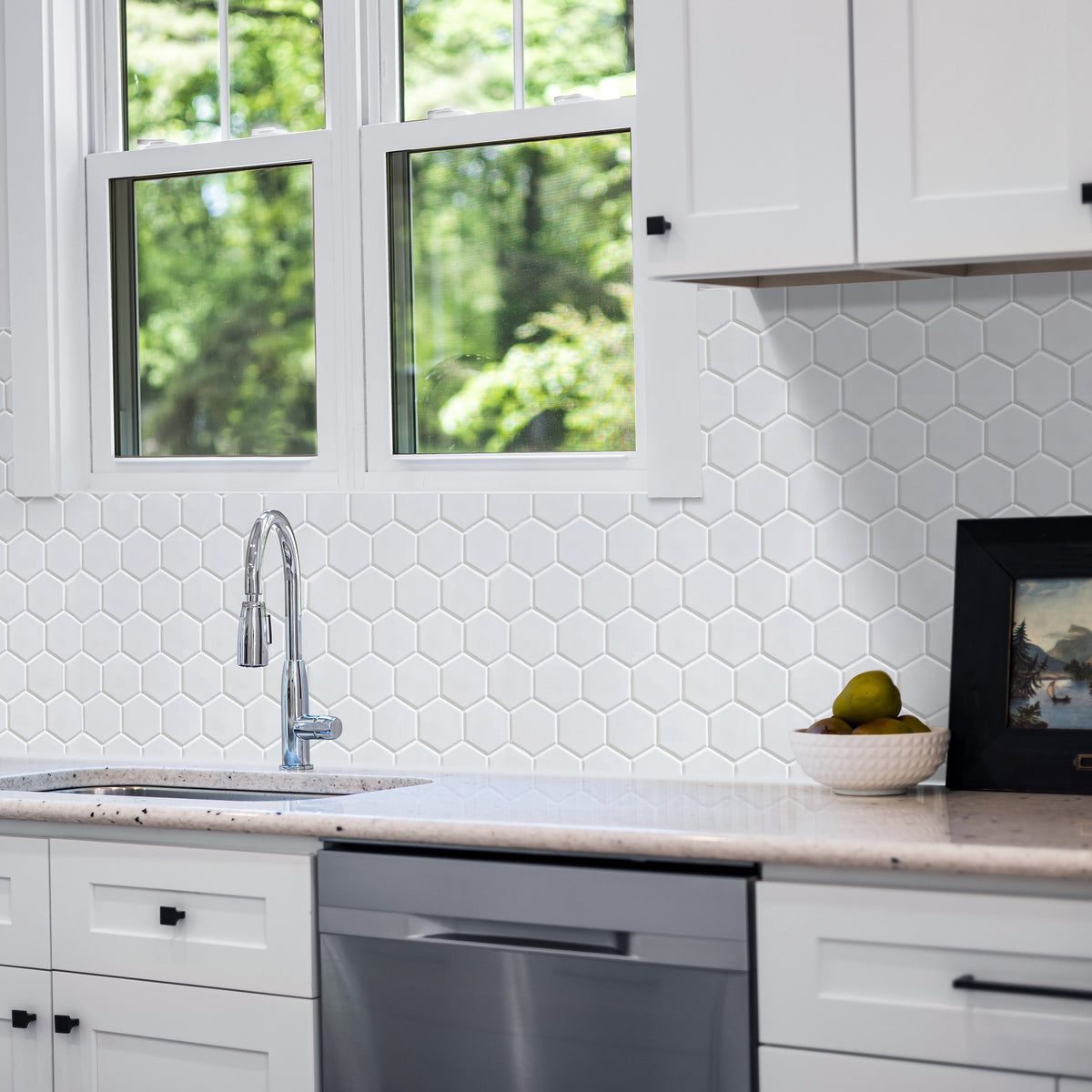 Modern kitchen backsplash featuring White 2-inch Hexagon Matte Porcelain Tiles – a minimalist, clean look using 12x12 mosaic sheets.