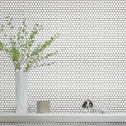 Bathroom wall featuring Penny Round White Mosaic Tiles – classic 12.4x11.5 matte white rounds in a bright, minimalist setting.