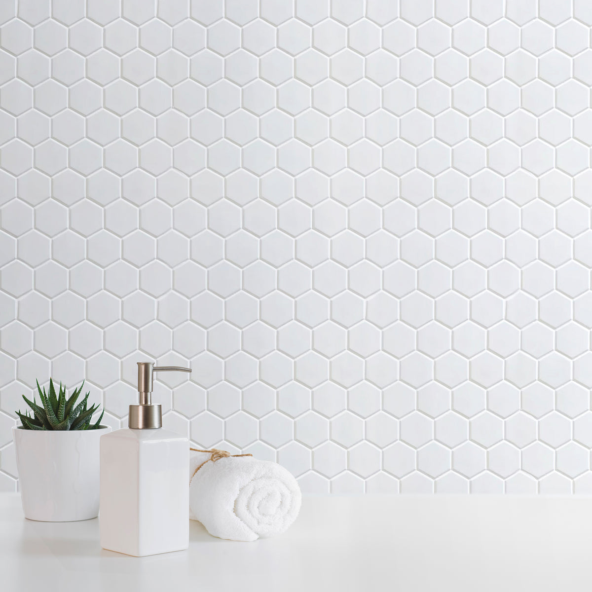 Bathroom wall featuring White 2-inch Hexagon Porcelain Mosaic Tile – matte white hex tiles create a fresh, clean look.