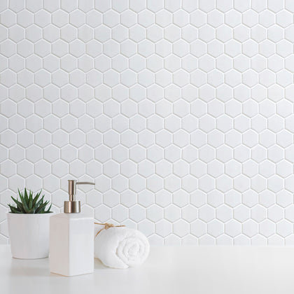 Bathroom wall featuring White 2-inch Hexagon Porcelain Mosaic Tile – matte white hex tiles create a fresh, clean look.