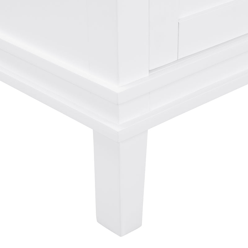 Elmington white vanity with porcelain top close-up of sleek leg and detailed edge design.