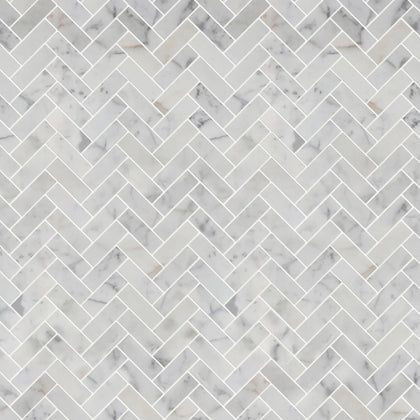 Sample display board of Calacatta Herringbone Honed Marble Mosaic Tile – elegant tile layout for showroom