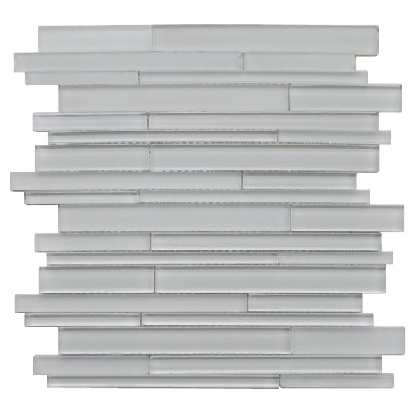 Sample piece of Nude Denim 6x18 Glass Mix Random Strip Mosaic Tile – contemporary glass mosaic with varied denim shades and textures.