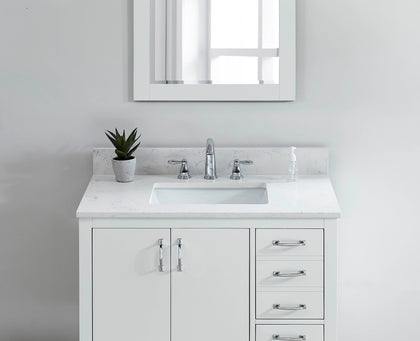 31-inch Carrara White Quartz Vanity Top with undermount sink and matching backsplash on a white bathroom cabinet.